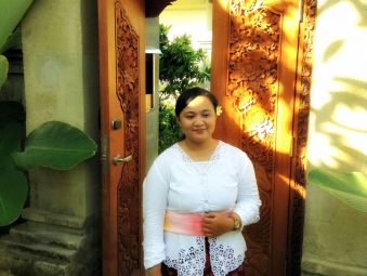 A Balinese girl before attending the Ogoh-ogoh parade