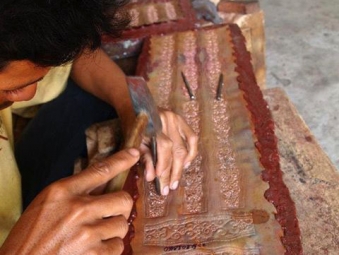 Artisans Carving Wood in Cambodia