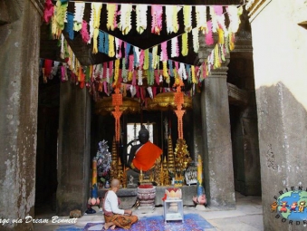 Buddhist Monk praying in Angkor