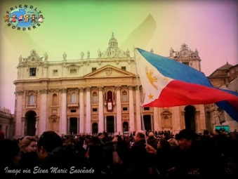 Man waves the Filipino flag at St. Peter's Square