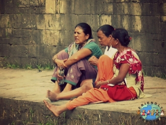 Three Nepali Hindus spend tme at Pashupatinath Temple in Kathmandu