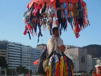 Vendor selling colourful beach textile