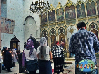 Georgian Orthodox pray at local church in Tbilisi, Georgia