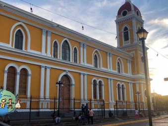 People stroll outside Our Lady of the Assumption Cathedral in Nicaragua