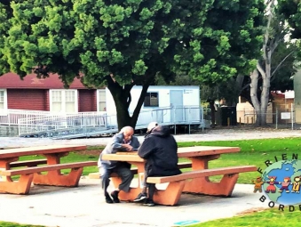 Two men playing chess in Polliwog Park, Manhattan Beach, California